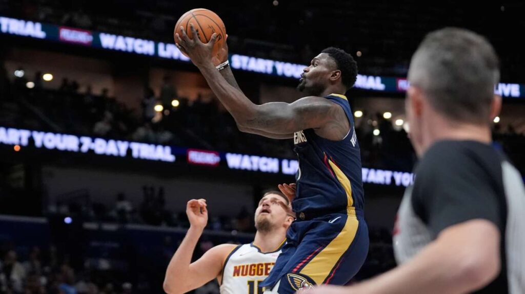 Zion Williamson scores 14 in his return from injury in the Pelicans' 125-118 loss to Denver. 