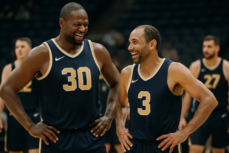 A tall frontcourt player contests a shot near the rim during team practice